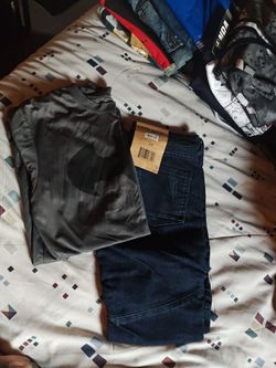 New boys pants from Macy's slim size 12 and Batman shirt size medium
