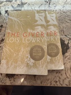 2 Copies of the book : The Giver by Lois Lowry