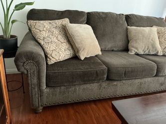 “Ashley Furniture” long sofa with free loveseat & cushions (Glendale)