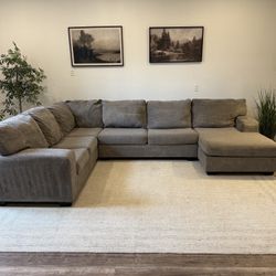 Light gray Ashley furniture sectional Couch Delivery Available 