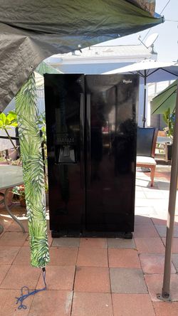 Black Whirlpool French doors fridge