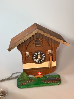 Cuckoo style clock