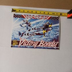 Back Them Up! Buy More Victory Bonds Ande Rooney's Porcelain Advertising Sign