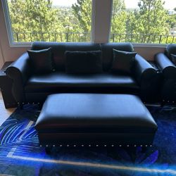 MOVE-OUT SALE: black leather couches & ottomans