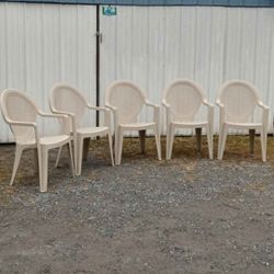 8 Total Plastic Chairs 