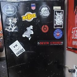 Mini Fridge $40 Works Great! I'll Remove Stickers. 