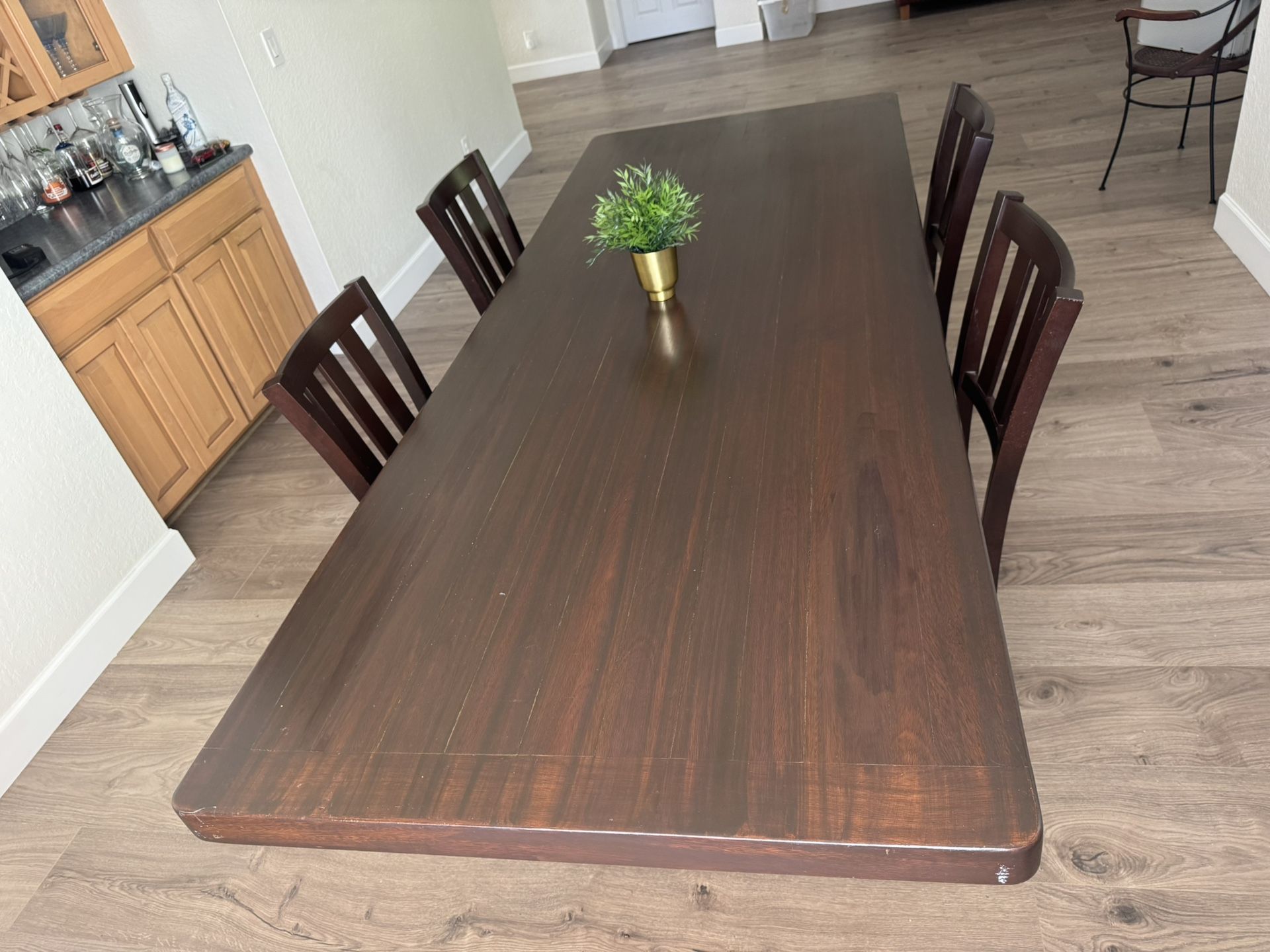 LOWER PRICE NOW Dining Table -solid wood with 8 Chairs (4 showing)