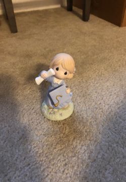 Precious moments figurine statue
