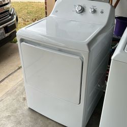 GE washer and dryer and  Black Refrigerator  like new
