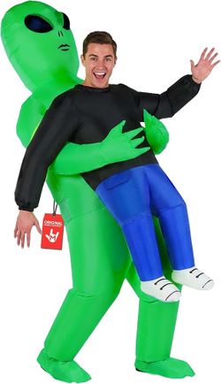 Halloween costume of an Alien Carrying a guy.