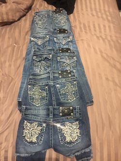 Miss Me girls jeans and shorts. Jeans are a size 7 and have a small hole forming in the leg. The Bermuda shorts are size 8 and 10. The capris and sho