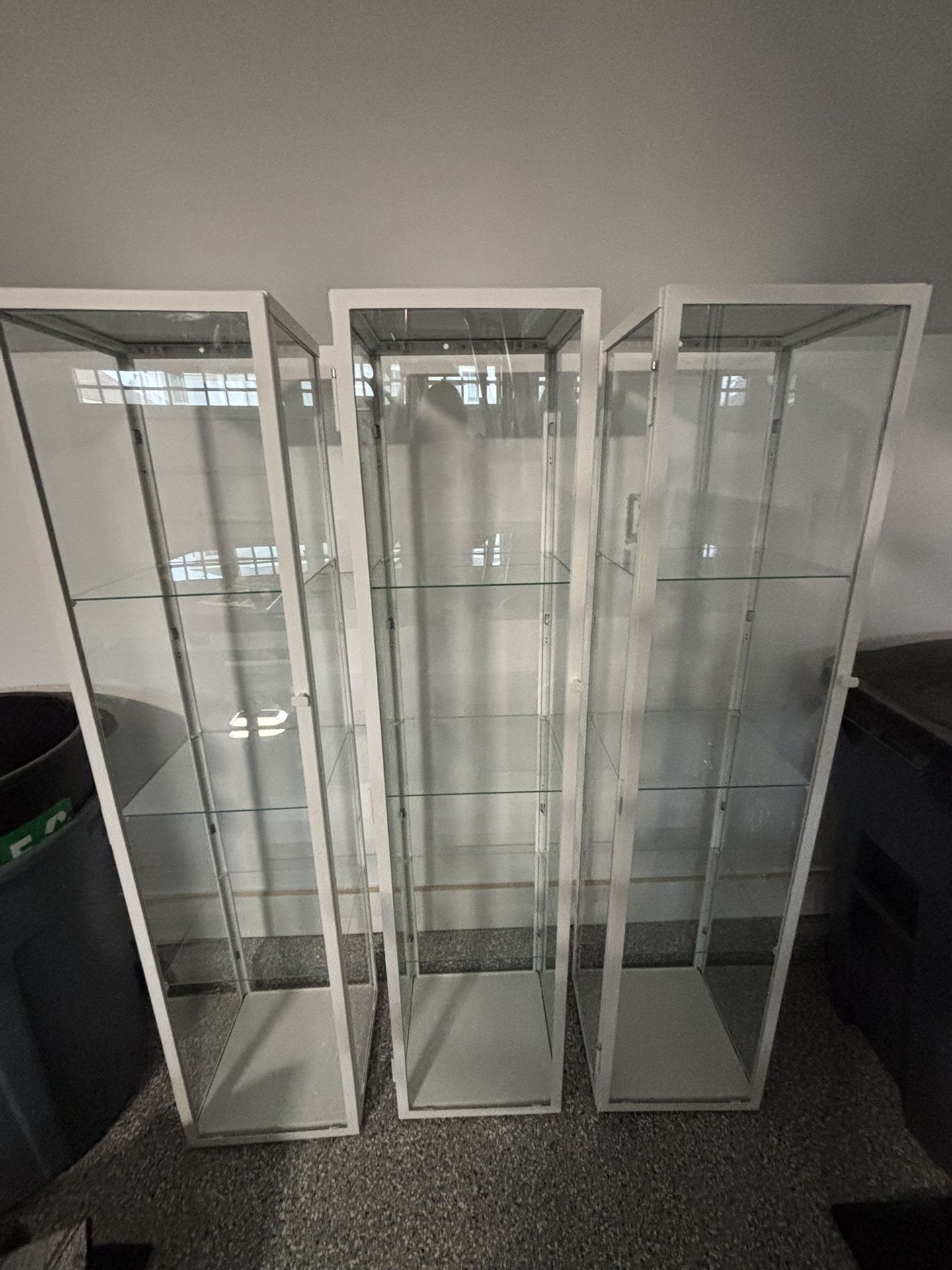 3 Modern Glass & Metal Curio Cabinets – Magnetic Doors, Excellent Condition – Sold Together or Separately