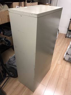 Metal Files Cabinet. Deep 24”
