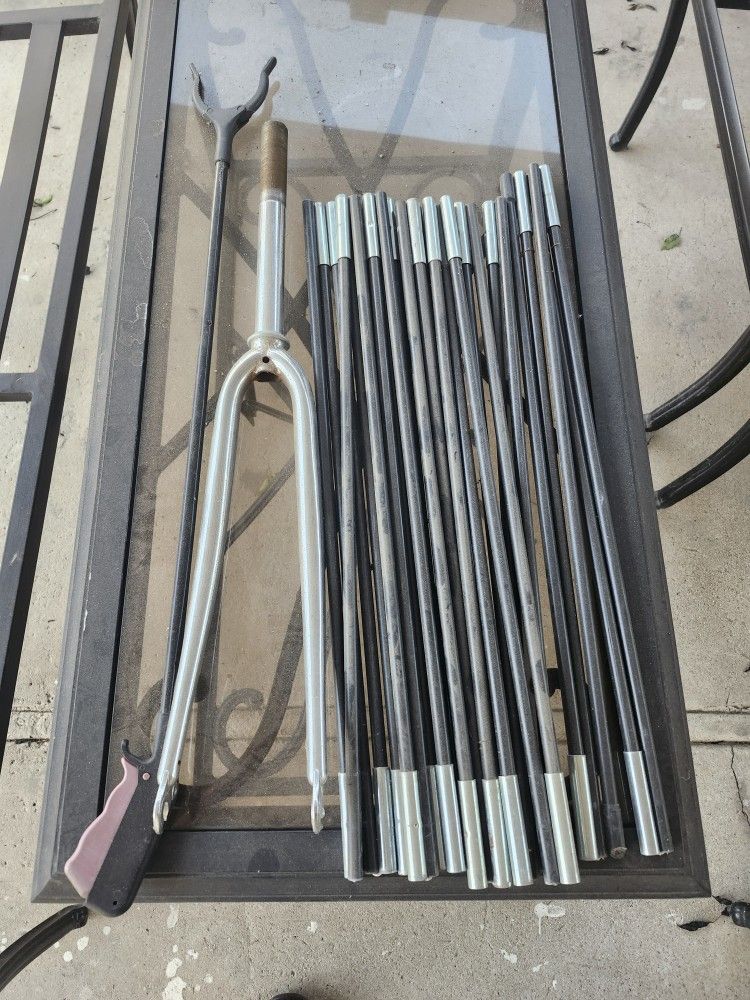 Bicycle Fork, Tent Poles, and a Trash Grabber.