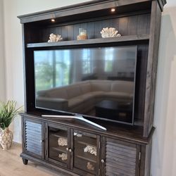 TV stand entertainment center Farmhouse Coastal weathered charcoal . brand is Magnussen