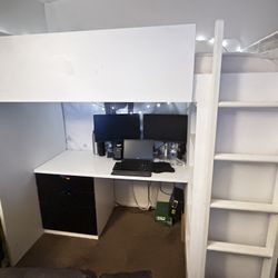 IKEA loft bed with three-drawer desk and cabinet