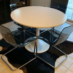 41” round table with four chairs