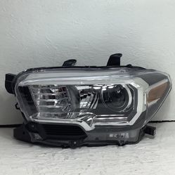 2016 2022 Toyota Tacoma left headlight W/ LED (1C)