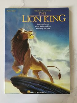 Lion King Sheet Music & More By Elton John - Piano, Vocal, & Lyrics and Guitar Chords. Great condition, never used. Color illustrati