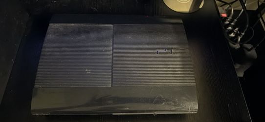 PlayStation 3 Super Slim with games 2 controllers