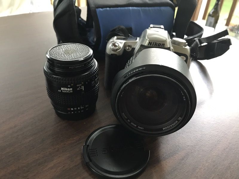 Nikon SLR N75 Camera with two lenses.