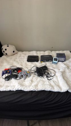 some of the wires are missing Bunch of retro video games some of the wires are missing