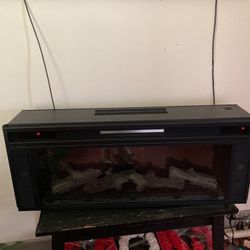 Electric fireplace with built-in Bluetooth speakers