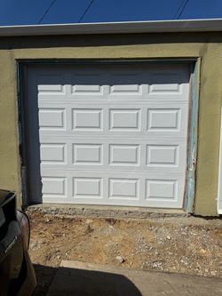 White Raised Panel Garage Door with opener