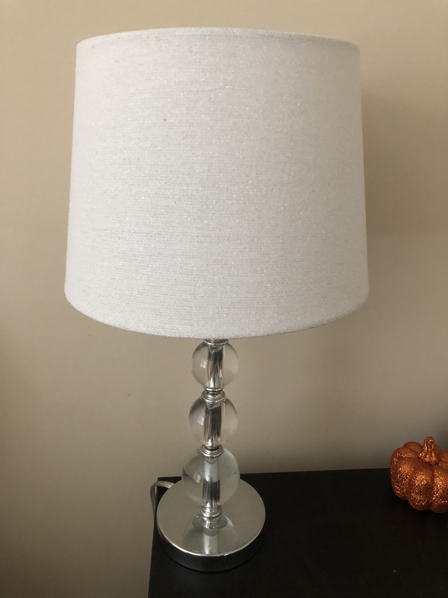 Mirrored lamp with white lamp shade