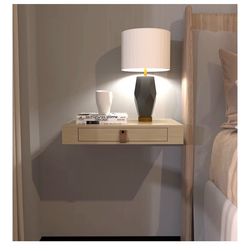 Floating wall shelf with drawer