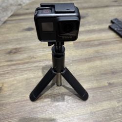 GoPro Hero7 Black — Waterproof Action Camera with Touch Screen 4K Ultra HD Video 12MP Photos 720p Live Streaming Stabilization with 4 battery 