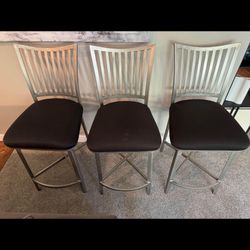 3 solid, high quality counter height swivel stools