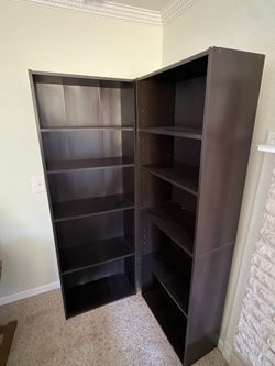 Dark brown bookshelves