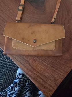 Noonday Collection crossbody leather bag 8' width x 4.75' height