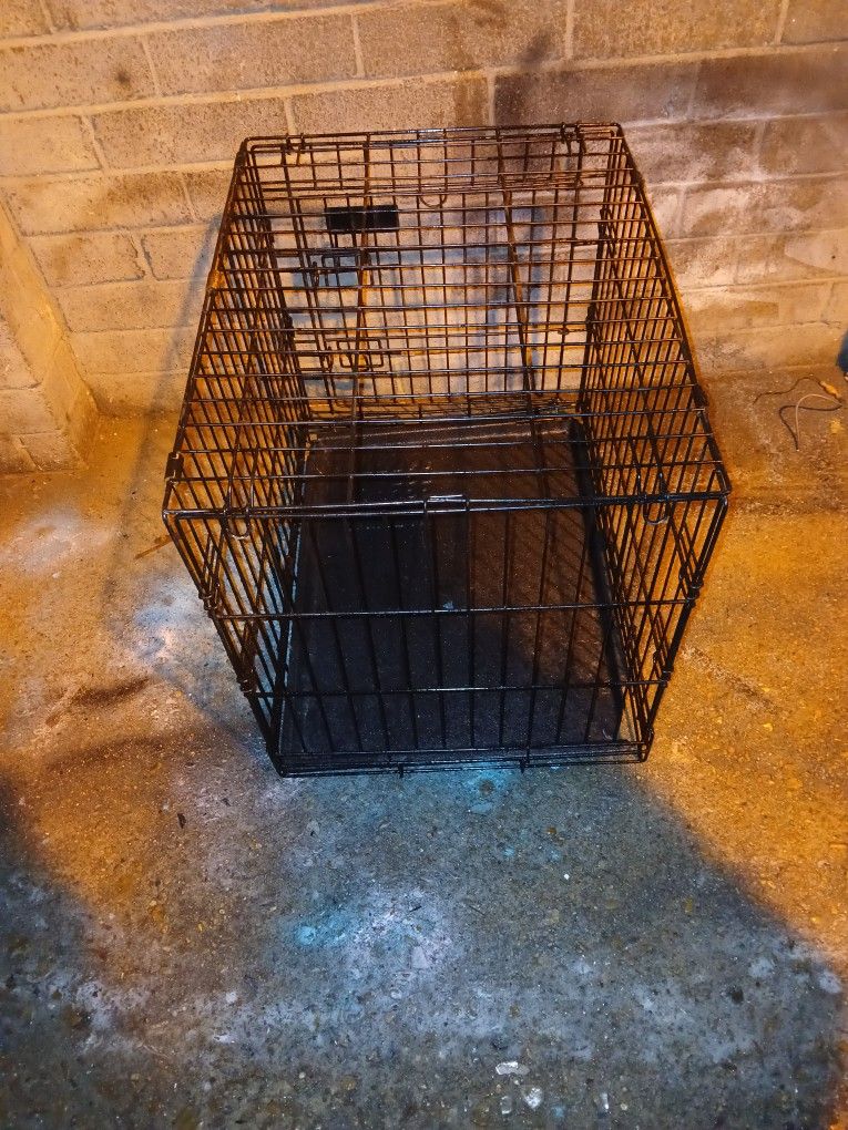Folding dog cage. 24in Long ×20in Wide×20inches Tall