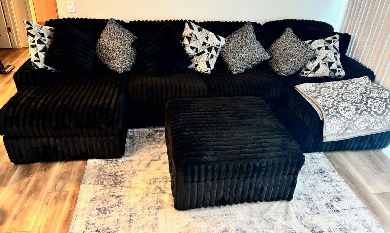 Black Sectional With Ottoman