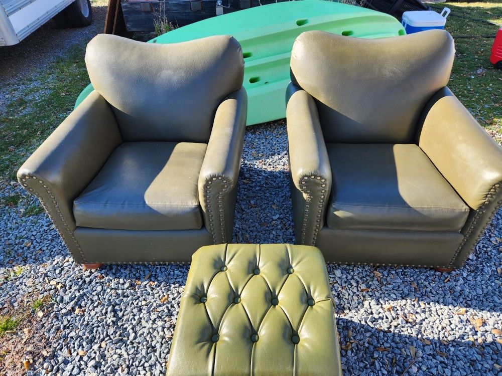 Two Chairs with a Footstool.