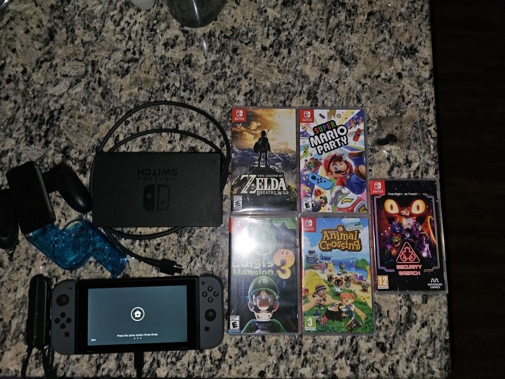 Nintendo Switch with games and accessories