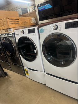 Set front load Steam LG white w 27 pedestal washer