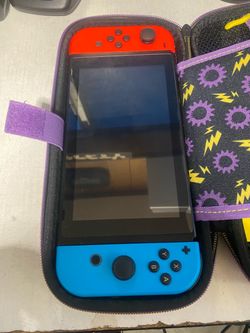 Nintendo Switch with Neon Joy-Cons and Carry Case