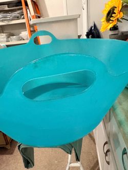 Giant green plastic bucket with handles