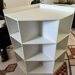 White corner shelf and storage piece 