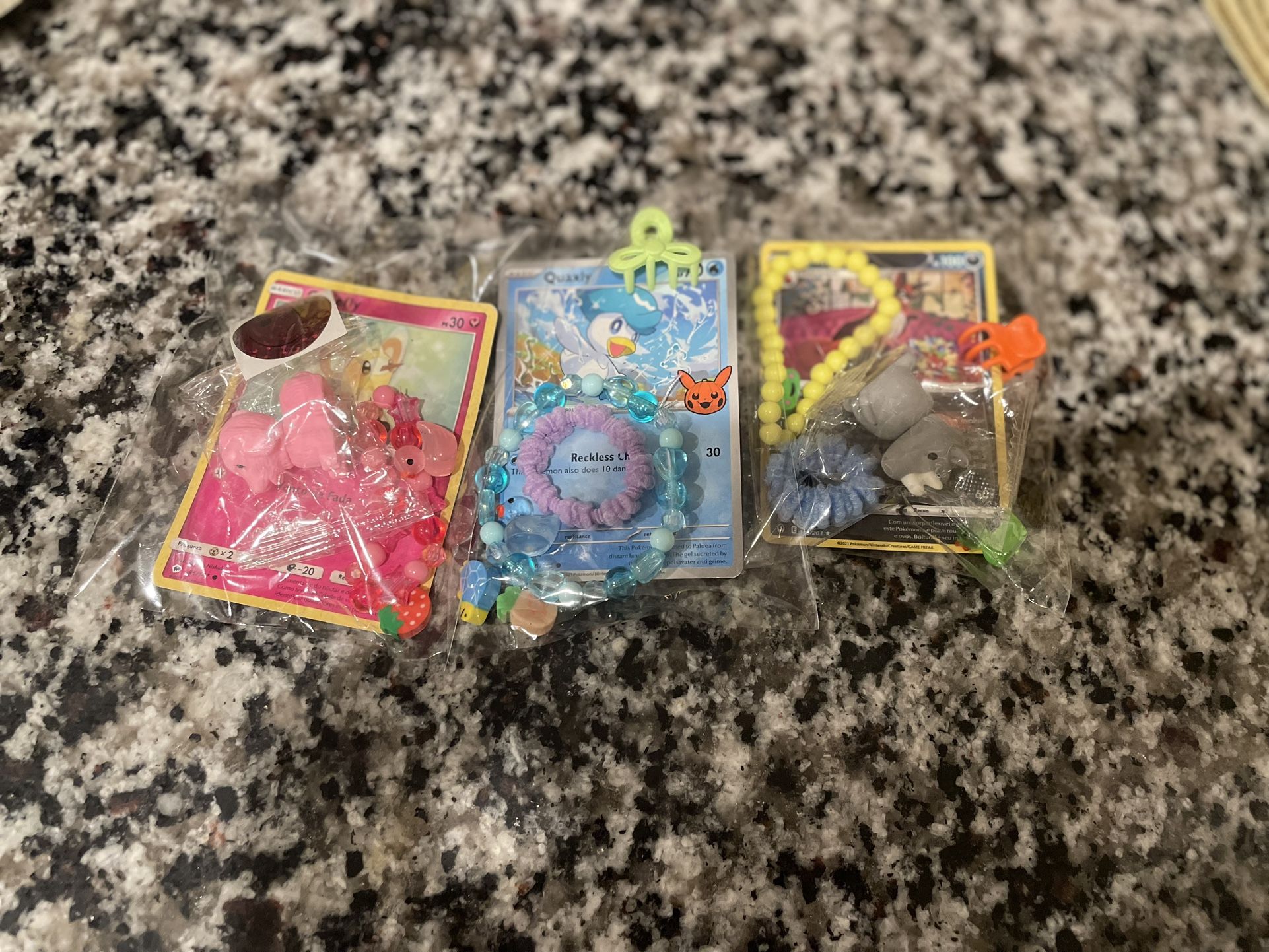 Pokémon cards and other stuff in cute packaging