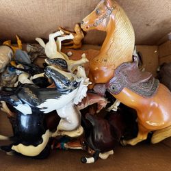 Houses and eagle figurines