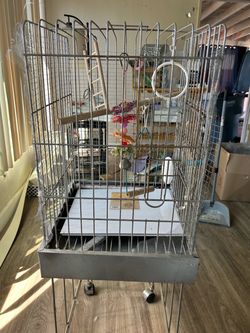 Grayish Metal Parrot Cage on wheels