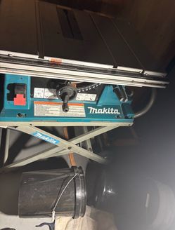 Makita 2705 table saw  W/stand