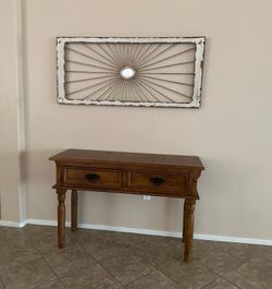Rustic White Wall Art Paired With A 2 Drawer Entryway Table