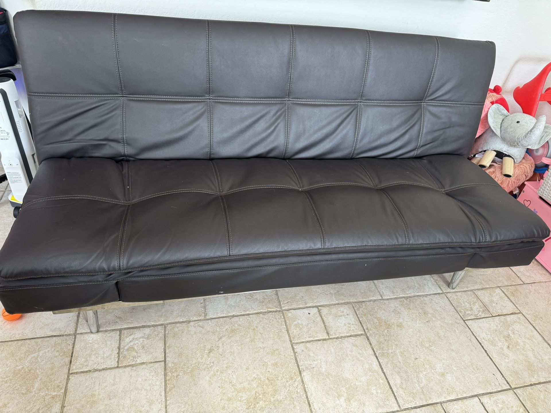 Futon Converts Into Bed