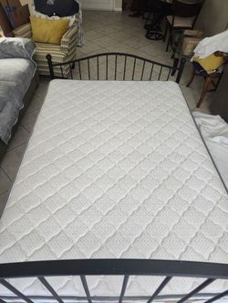 Newer Full Size Bed Used 7 times- complete with headboard footboard comforter mattress pad box springs and duvet all for $134.99.- firm