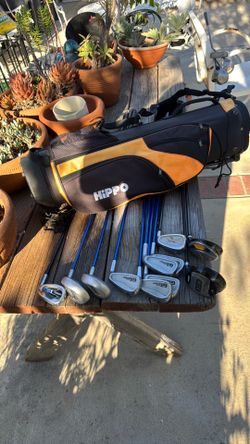 11 golf clubs with golf bag for jr. players 7 irons by play it big , by  jr golf 1 jr. driver by ace 1 hybrid by top Flite. 1 hybrid by. Top Flite, 2 